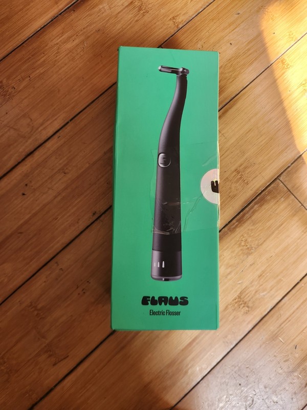 FLAUS Black Electric Flosser Starter Kit with 45 Heads Refills NEW OPEN BOX