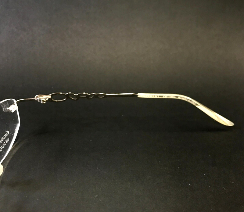 Charmant Eyeglasses Frames CH11914 WP Silver Ivory Rimless Oval WP 51-17-130 gallery