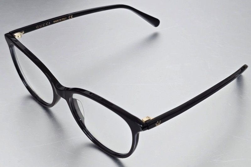 Gucci Black Rounded Cat Eye Unisex Eyeglasses GG0550O 001
