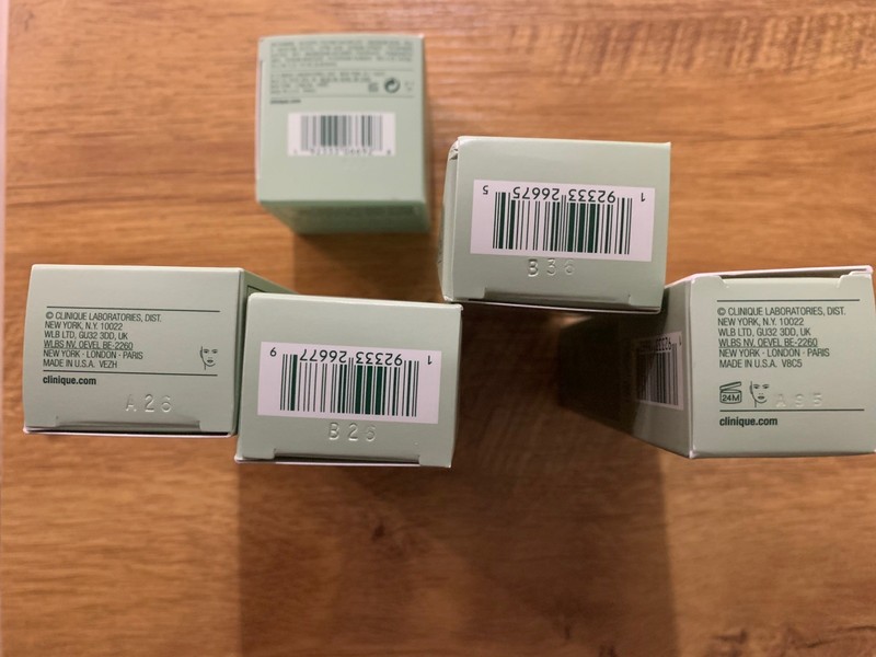 Clinique LOT - dark Spot Corrector, moisture surge, spf — see pics NIB gallery